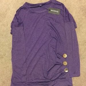Long sleeve purple shirt w/ buttons down the shirt
